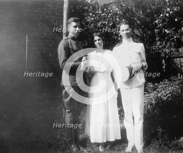 Mrs. Abby Scott Baker And Sons, 1917 or 1918. Creator: Harris & Ewing.