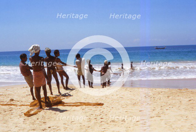 Pulling in Fishing Net from Indian Ocean, Hikkaduwa, West Coast Sri Lanka, 20th century. Artist: CM Dixon.