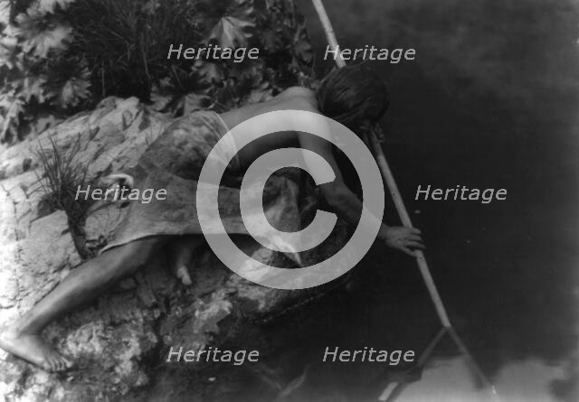 Hupa fisherman, 1923. Creator: Edward Sheriff Curtis.