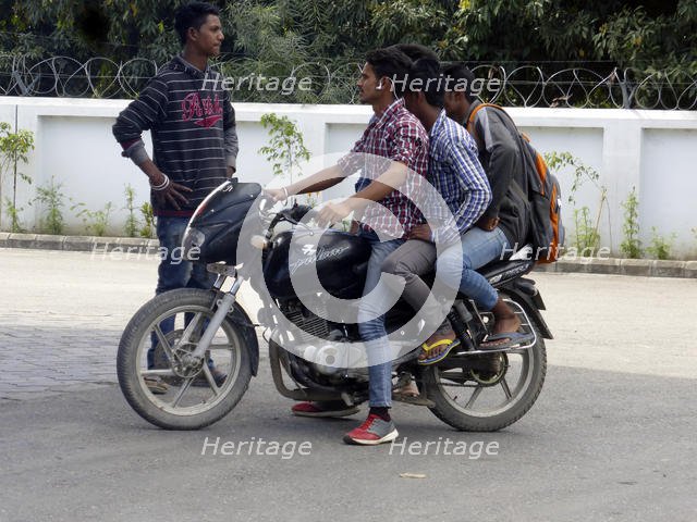 Motorcyclist with passengers, Uttarakhand India. Creator: Unknown.