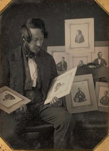 Frederick Langenheim Looking at Talbotypes, ca. 1849-51. Creators: William Langenheim, Frederick Langenheim.