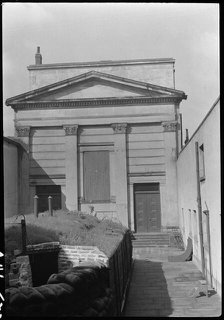 Chapel at Hull Trinity House and statue outside east front, Kingston upon Hull, 1941. Creator: George Bernard Wood.