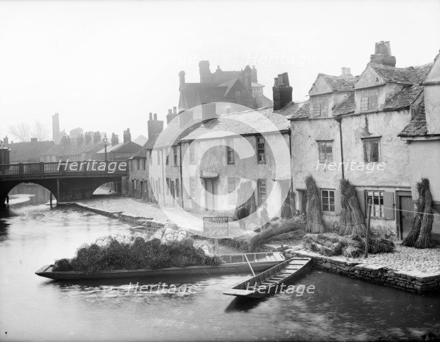 Abel Beesley, Oxford University waterman, and his rush punt, Fisher Row, Oxford, c1860-c1922. Artist: Henry Taunt