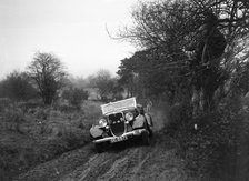 Ford V8 of H Hillcoat at the Sunbac Colmore Trial, near Winchcombe, Gloucestershire, 1934. Artist: Bill Brunell.