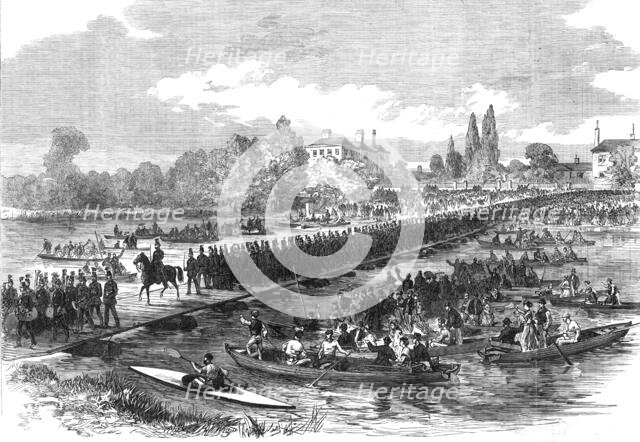The Volunteer Review at Windsor: volunteers crossing the pontoon bridge over the Thames..., 1868. Creator: Unknown.