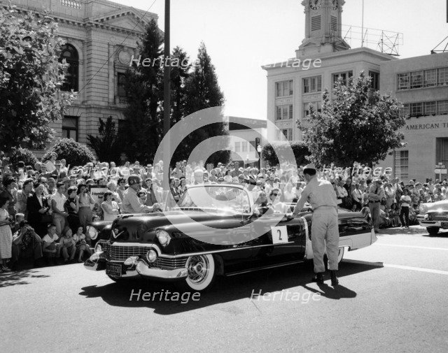 Cadillac convertible in a street parade, USA, (c1958?). Artist: Unknown