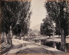 Kashmir: a tree-lined path by a canal, c1870s. Creator: Samuel Bourne.