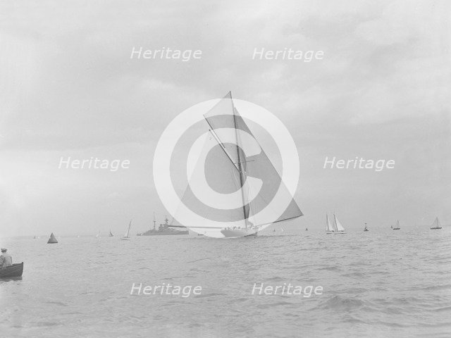 The racing cutter 'Terpisichore' running downwind, 1922. Creator: Kirk & Sons of Cowes.