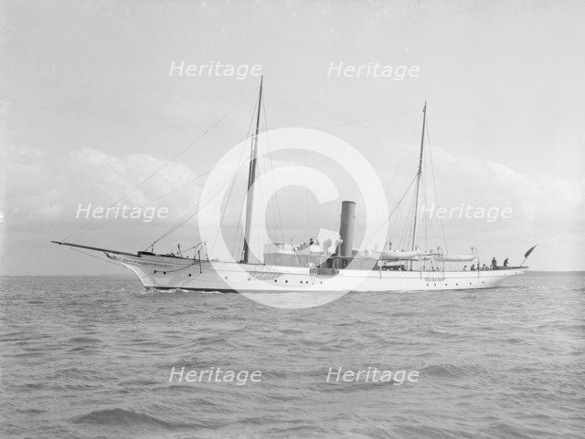 The 70 ton steam yacht 'Ombra' under way, 1914. Creator: Kirk & Sons of Cowes.