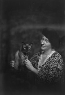 Malvina Hoffman with cat, portrait photograph, 1933 June 27. Creator: Arnold Genthe.