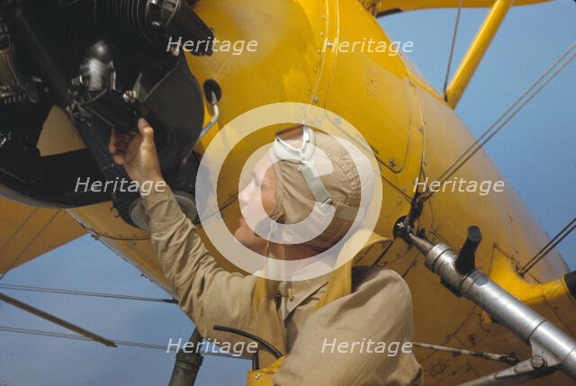 Marine lieutenant by the power towing plane for the gliders at Parris Island, S.C., 1942. Creator: Alfred T Palmer.