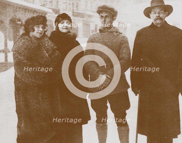 Moura Budberg (second from left) with Maxim Gorky (right), c. 1920. Artist: Anonymous  