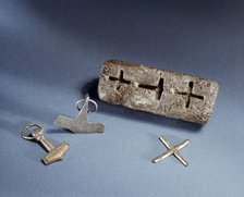 Smith's mould for casting both Christian crosses and Thor's hammers.