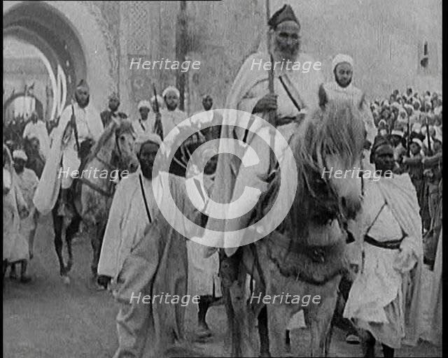 Male Cavalry Soldiers Entering a Town, 1920s. Creator: British Pathe Ltd.