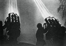Searchlight operators preparing for a night bombing raid, Moscow, 1941. Artist: Unknown