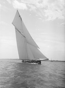 The gaff rigged cutter 'Bloodhound' sailing close-hauled, 1911. Creator: Kirk & Sons of Cowes.