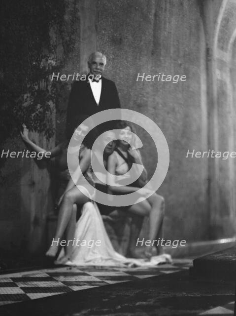 Kahn, Otto H., Mr., and unidentified women, outdoors, 1928 Creator: Arnold Genthe.