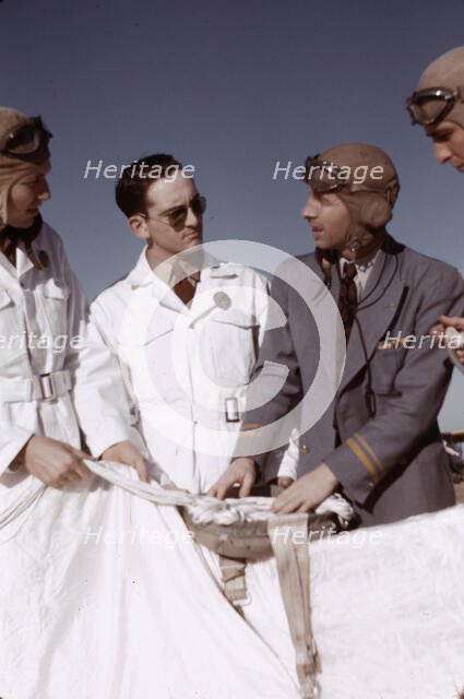 Instructor explaining the operation of a parachute to student pilots, Fort Worth, Tex., 1942. Creator: Arthur Rothstein.