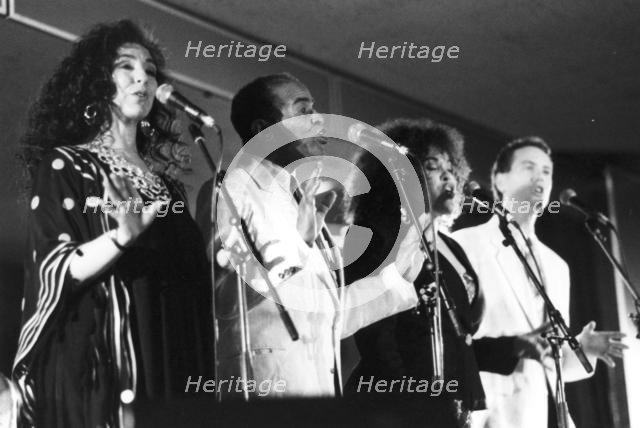 Jon Hendricks with three unidentified singers, c1998. Creator: Brian Foskett.