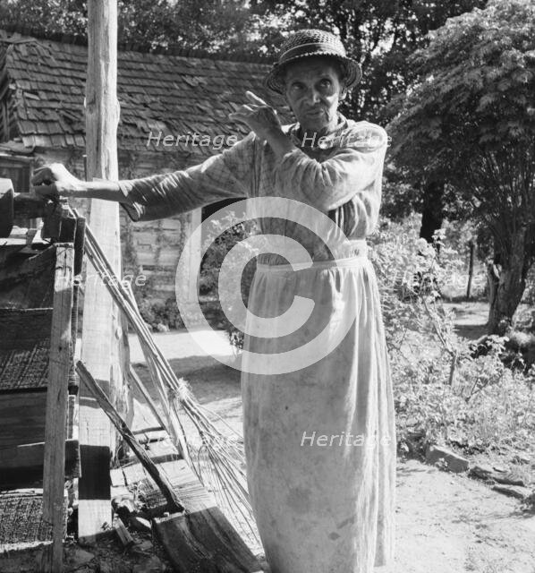 Caroline Atwater, wife of Negro owner, tells how they got their place, 1939. Creator: Dorothea Lange.