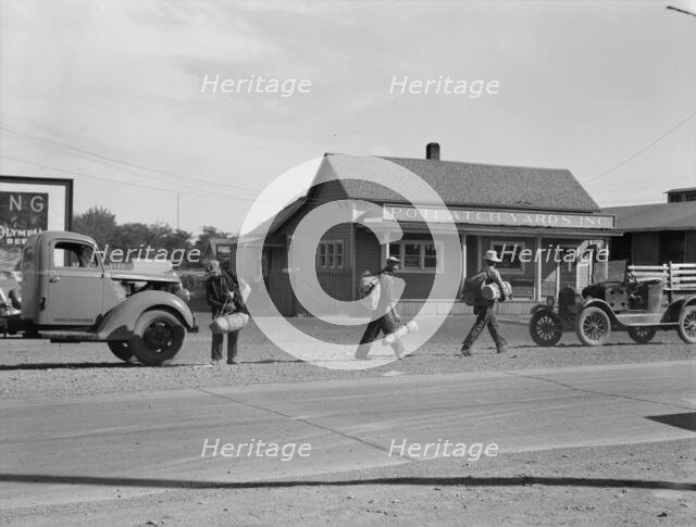 Single itinerant men on way to railroad yard, near Toppenish, Yakima Valley, Washington, 1939. Creator: Dorothea Lange.