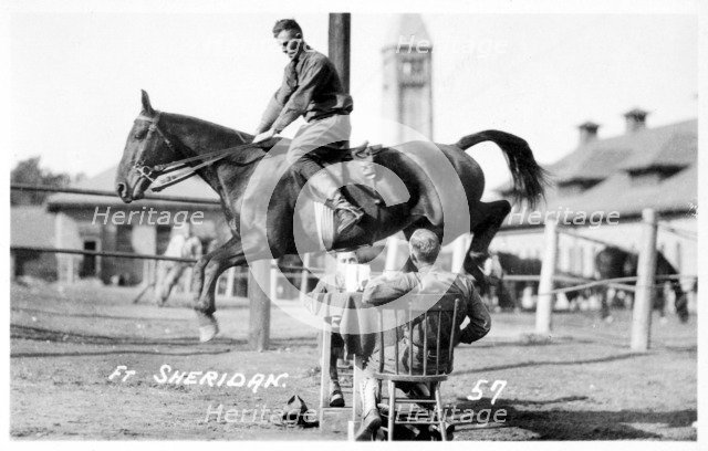 Soldiers performing equestrian stunts, Fort Sheridan, Illinois, USA, 1920. Artist: Unknown