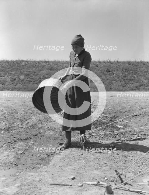 A grandmother in a migrant camp, Stanislaus County, California, 1939. Creator: Dorothea Lange.