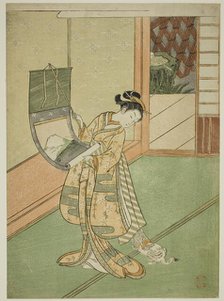 Hanging a Painting (parody of the Third Princess), c. 1767. Creator: Suzuki Harunobu.