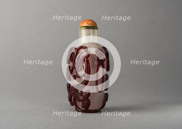 Clear glass snuff bottle with red overlay, China, Qing dynasty, 1644-1911. Creator: Unknown.