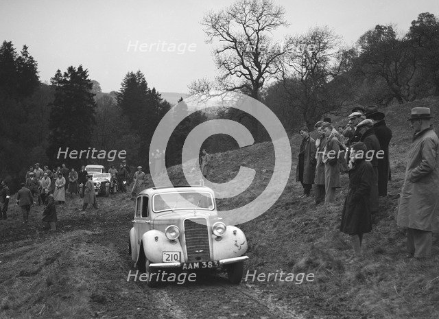 Hillman Minx of S Elgar competing in the MCC Edinburgh Trial, Roxburghshire, Scotland, 1938. Artist: Bill Brunell.