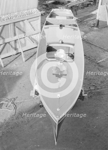 Motor launch in boatyard, 1913. Creator: Kirk & Sons of Cowes.
