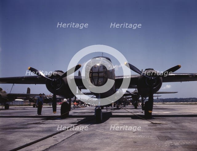 B-25 bombers on the outdoor assembly line at North American Aviation..., Kansas City, Kansas, 1942. Creator: Alfred T Palmer.