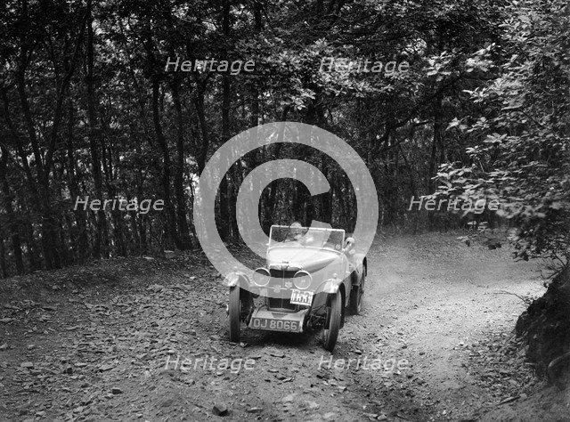 MG J2 competing in the B&HMC Brighton-Beer Trial, Fingle Bridge Hill, Devon, 1934. Artist: Bill Brunell.