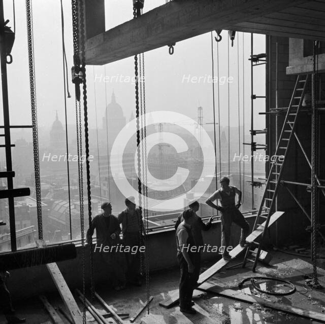 A scene from the construction of an unidentified tall building to the north-east of St..., 1955-65. Creator: John Gay.