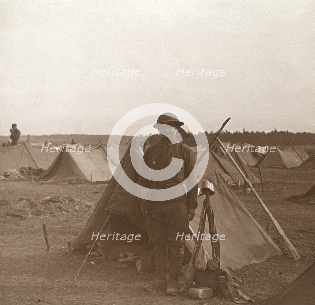 Soldier standing by tent, American camp, Melette, France, c1914-c1918.  Artist: Unknown.
