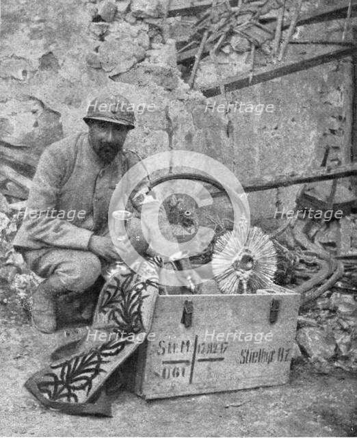 'A travers le champ de bataille; apres notre reoccupation de Breny (Aisne), un pretre..., 1918. Creator: Unknown.