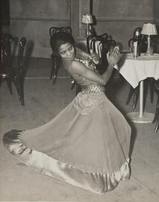 Zola King, eccentric dancer doing her nightly stunt in the cabaret scene, 1937. Creator: Unknown.