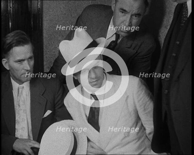 A Group of Male American Civilians Dressed in a Gangster Fashion, 1930. Creator: British Pathe Ltd.