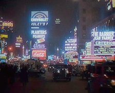 New York Times Square at Night Lit up By Lights, 1920s. Creator: British Pathe Ltd.