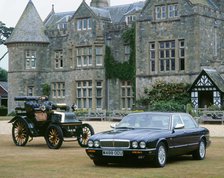 1995 Daimler Double six with 1899 Daimler outside Palace House. Artist: Unknown.