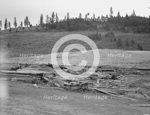 The remains of the sawmill in a deserted mill town, Tamarack, Adams County, Idaho, 1939. Creator: Dorothea Lange.
