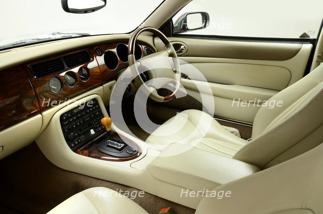 1999 Jaguar XK8 coupe Artist: Unknown.