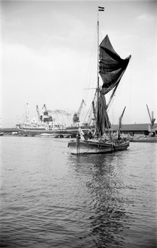A Thames sailing barge in the Royal Albert Dock, Canning Town, London, c1945-c1965. Artist: SW Rawlings