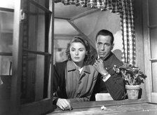 Ingrid Bergman and Humphrey Bogart in 'Cassablanca', 1942. Artist: Unknown