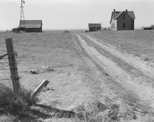 Abandoned farmhouse in Columbia Basin, one mile east of Quincy, Grant County, Washington, 1939. Creator: Dorothea Lange.