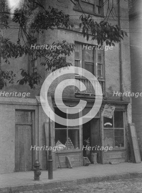 Facade of a grocery store, New Orleans or Charleston, South Carolina, between 1920 and 1926. Creator: Arnold Genthe.