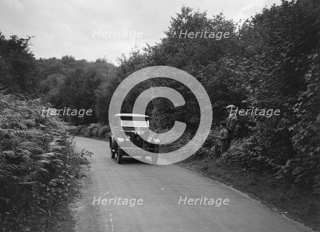Morris Minor taking part in a First Aid Nursing Yeomanry trial or rally, 1931. Artist: Bill Brunell.