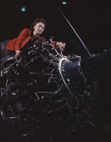 Woman at work on motor, Douglas Aircraft Company, Long Beach, Calif., 1942. Creator: Alfred T Palmer.