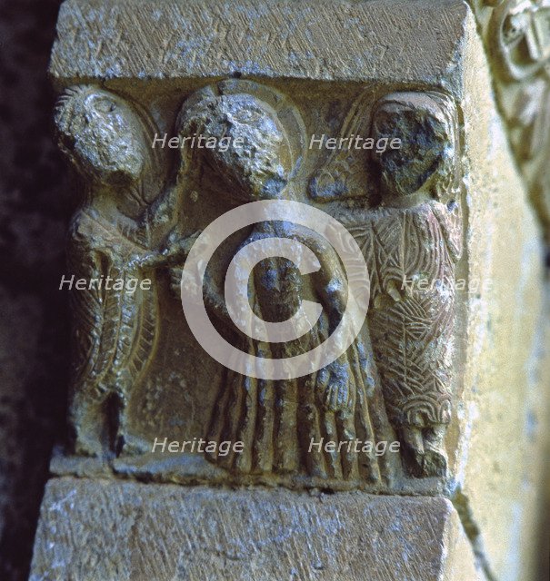 'Saint John baptising Christ', capital of the front of the church of San Juan de Montañana (Hues…