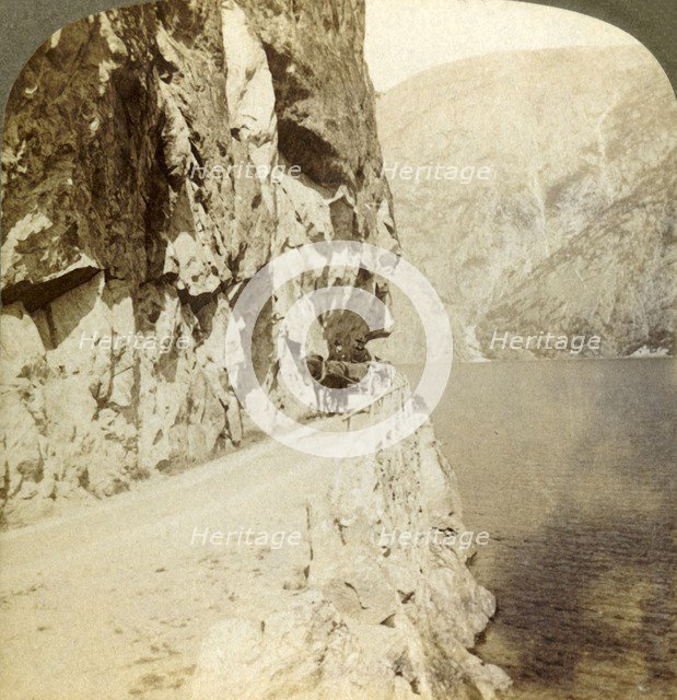 'Path blasted out of the towering cliffs for a road around Oifjords Lake, Norway', 1905. Creator: Unknown.